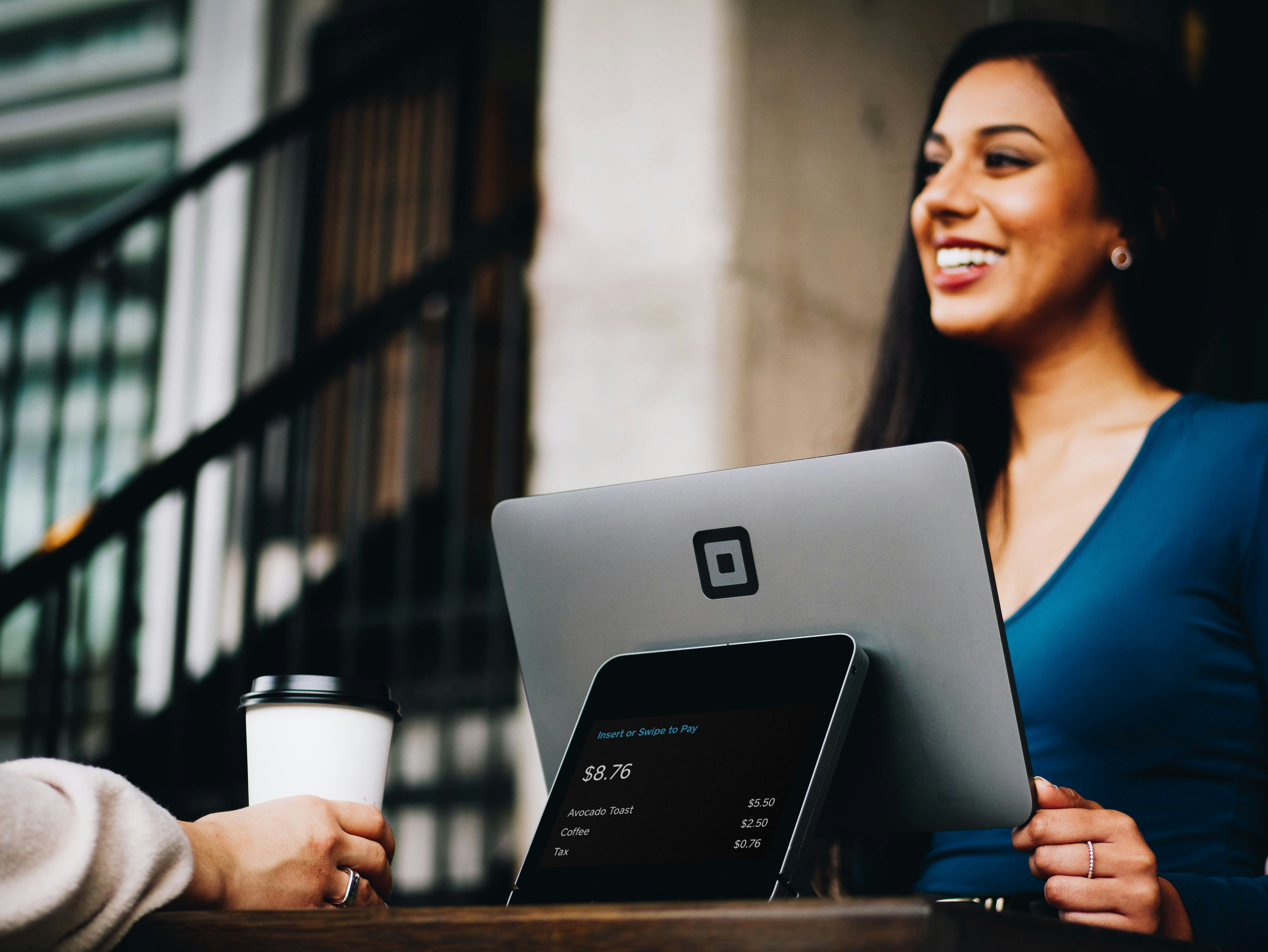 girl smiling on a counter - Customer Journey Insights